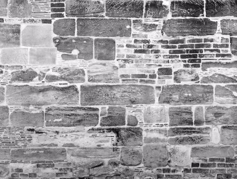 Mortared stone wall